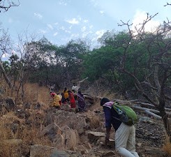 Pilgrims carrying water